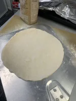 5-on-pizza-peel.webp